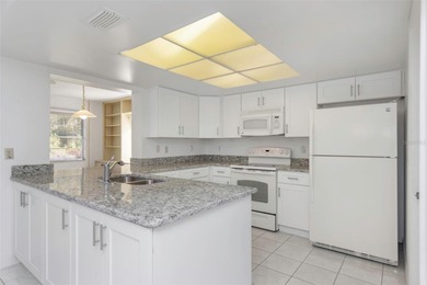 * * BEAUTIFULLY UPDATED CONDO WITH POND VIEWS! * * Come see this on Falcon Watch Golf Club in Florida - for sale on GolfHomes.com, golf home, golf lot