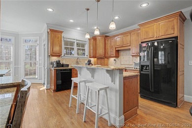 Welcome to this stunning executive all-brick home, tucked behind on Anderson Creek Golf Club in North Carolina - for sale on GolfHomes.com, golf home, golf lot