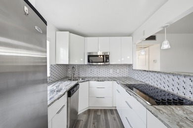 Welcome to 97 Saxony C, a spacious 2-bedroom, 2-bath TRUE corner on Addison Reserve in Florida - for sale on GolfHomes.com, golf home, golf lot