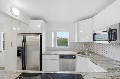 Welcome to 97 Saxony C, a spacious 2-bedroom, 2-bath TRUE corner on Addison Reserve in Florida - for sale on GolfHomes.com, golf home, golf lot