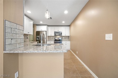 This beautifully updated attached villa offers the perfect blend on Copperhead Golf Club in Florida - for sale on GolfHomes.com, golf home, golf lot