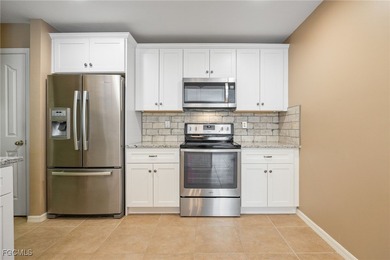 This beautifully updated attached villa offers the perfect blend on Copperhead Golf Club in Florida - for sale on GolfHomes.com, golf home, golf lot