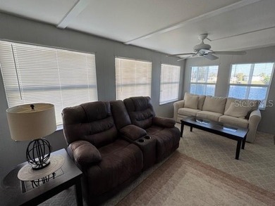 Laid back Florida living at it's finest Blue Cypress Golf and RV on Blue Cypress Golf and RV Resort in Florida - for sale on GolfHomes.com, golf home, golf lot