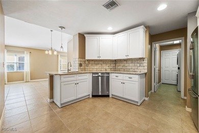 This beautifully updated attached villa offers the perfect blend on Copperhead Golf Club in Florida - for sale on GolfHomes.com, golf home, golf lot