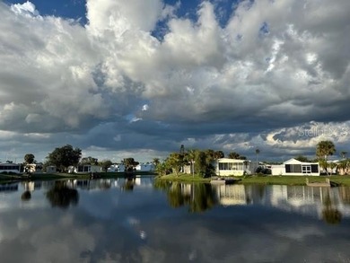 Laid back Florida living at it's finest Blue Cypress Golf and RV on Blue Cypress Golf and RV Resort in Florida - for sale on GolfHomes.com, golf home, golf lot