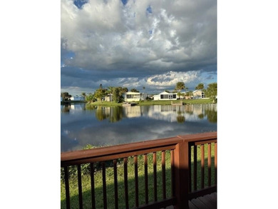 Laid back Florida living at it's finest Blue Cypress Golf and RV on Blue Cypress Golf and RV Resort in Florida - for sale on GolfHomes.com, golf home, golf lot