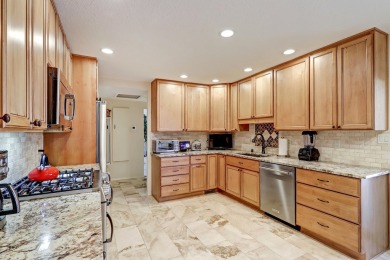 Beautifully updated corner-unit townhome in Villa Serena, within on The Canyon Club in New Mexico - for sale on GolfHomes.com, golf home, golf lot