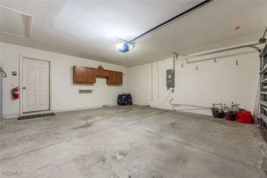 This beautifully updated attached villa offers the perfect blend on Copperhead Golf Club in Florida - for sale on GolfHomes.com, golf home, golf lot