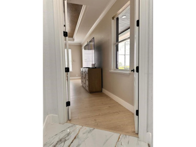 Welcome to your next home in the prestigious gated community of on Kissimmee Bay Country Club in Florida - for sale on GolfHomes.com, golf home, golf lot