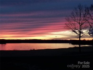 This Badin Lake water view lot is located in the prestigious on Old North State Club at Uwharrie Point Golf community in North Carolina - for sale on GolfHomes.com, golf home, golf lot