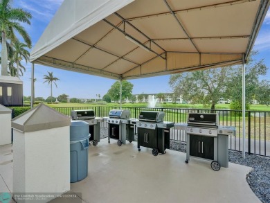 NEWLY RENOVATED, 4TH FLOOR LUXURY CORNER UNIT! Step into luxury on Wynmoor Golf Course in Florida - for sale on GolfHomes.com, golf home, golf lot