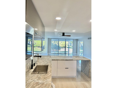 Impeccable 3BR/2BA corner unit in Palm-Aire! Completely on Palm-Aire Country Club and Resort - Palms in Florida - for sale on GolfHomes.com, golf home, golf lot