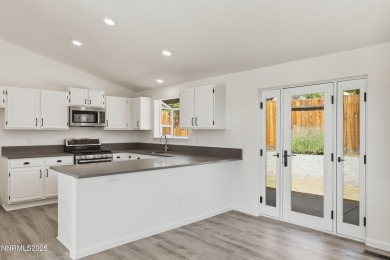 Beautifully Updated Indian Hills Gem! Perfectly situated on a on Sun Ridge Golf Course in Nevada - for sale on GolfHomes.com, golf home, golf lot