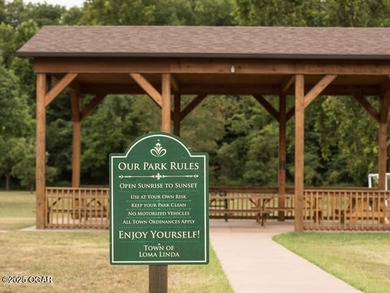 Enjoy a relaxing lifestyle with luxury perks surrounded by on The Bald Eagle Course At Eagle Creek Golf Club in Missouri - for sale on GolfHomes.com, golf home, golf lot