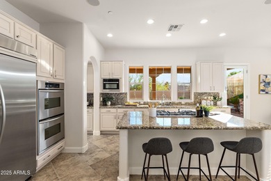 Discover this stunning residence nestled within the gated on The Country Club At DC Ranch in Arizona - for sale on GolfHomes.com, golf home, golf lot