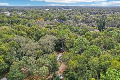 This expansive 3.68-acre property is a rare find in one of on Mayfair Country Club in Florida - for sale on GolfHomes.com, golf home, golf lot