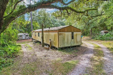 This expansive 3.68-acre property is a rare find in one of on Mayfair Country Club in Florida - for sale on GolfHomes.com, golf home, golf lot