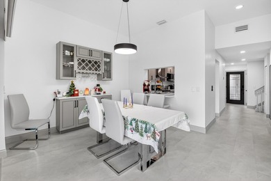 See this beautifully renovated, lake-front townhome superbly on Boca Delray Golf and Country Club in Florida - for sale on GolfHomes.com, golf home, golf lot