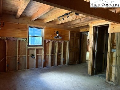 This property is being sold as-is and offers a unique on Land Harbor Golf Course in North Carolina - for sale on GolfHomes.com, golf home, golf lot