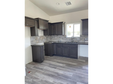 Beautiful new home on the abandoned golf course, which is now a on Concho Valley Country Club in Arizona - for sale on GolfHomes.com, golf home, golf lot