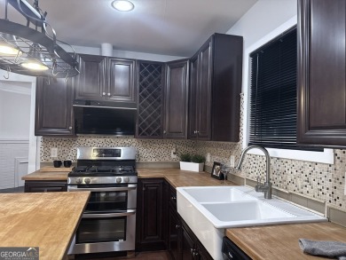 Charming and beautifully renovated spacious home in Historic on College Park Municipal Golf Course in Georgia - for sale on GolfHomes.com, golf home, golf lot
