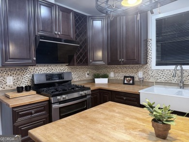 Charming and beautifully renovated spacious home in Historic on College Park Municipal Golf Course in Georgia - for sale on GolfHomes.com, golf home, golf lot