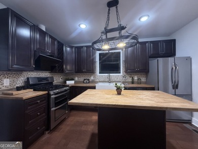 Charming and beautifully renovated spacious home in Historic on College Park Municipal Golf Course in Georgia - for sale on GolfHomes.com, golf home, golf lot
