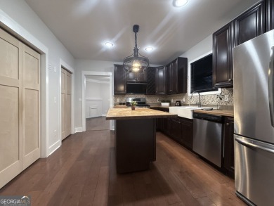 Charming and beautifully renovated spacious home in Historic on College Park Municipal Golf Course in Georgia - for sale on GolfHomes.com, golf home, golf lot