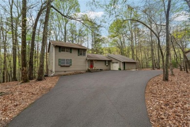 Ideally located just off Quail Cove and moments from the Marina on Big Canoe Golf Club - Cherokee in Georgia - for sale on GolfHomes.com, golf home, golf lot