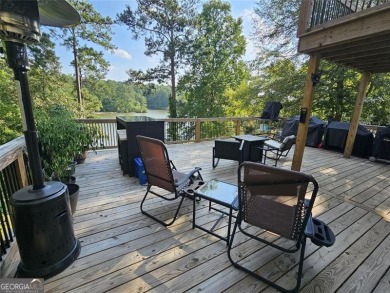 Check out this awesome lakefront property on Jackson Lake in the on Turtle Cove Golf Course in Georgia - for sale on GolfHomes.com, golf home, golf lot