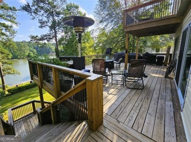 Check out this awesome lakefront property on Jackson Lake in the on Turtle Cove Golf Course in Georgia - for sale on GolfHomes.com, golf home, golf lot