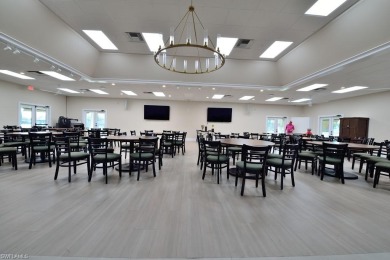 Stunning 2 bedroom 2 bath lake views condo in Estero. This on Breckenridge Golf and Country Club in Florida - for sale on GolfHomes.com, golf home, golf lot