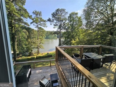 Check out this awesome lakefront property on Jackson Lake in the on Turtle Cove Golf Course in Georgia - for sale on GolfHomes.com, golf home, golf lot