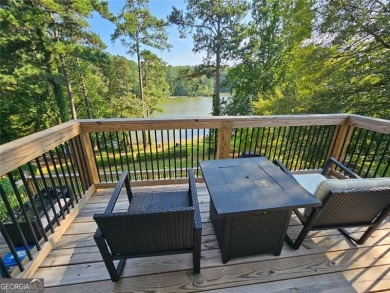 Check out this awesome lakefront property on Jackson Lake in the on Turtle Cove Golf Course in Georgia - for sale on GolfHomes.com, golf home, golf lot