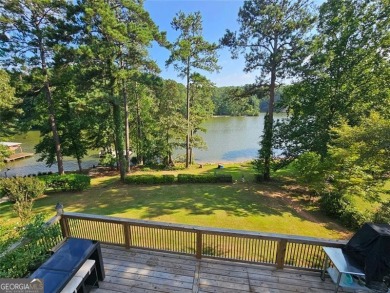 Check out this awesome lakefront property on Jackson Lake in the on Turtle Cove Golf Course in Georgia - for sale on GolfHomes.com, golf home, golf lot