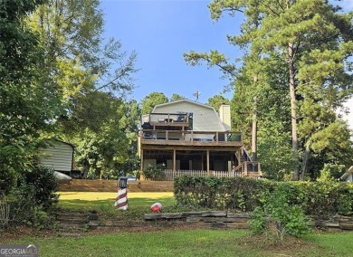 Check out this awesome lakefront property on Jackson Lake in the on Turtle Cove Golf Course in Georgia - for sale on GolfHomes.com, golf home, golf lot