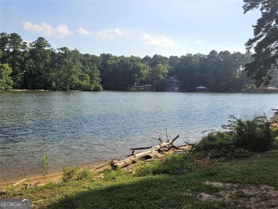 Check out this awesome lakefront property on Jackson Lake in the on Turtle Cove Golf Course in Georgia - for sale on GolfHomes.com, golf home, golf lot