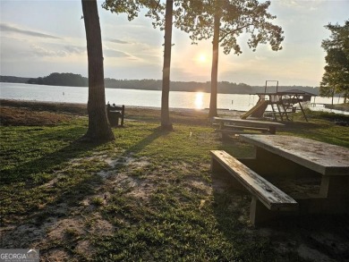 Check out this awesome lakefront property on Jackson Lake in the on Turtle Cove Golf Course in Georgia - for sale on GolfHomes.com, golf home, golf lot