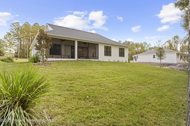 Welcome to this exceptional 2024 Arthur Rutenberg home on Southern Hills Plantation Club in Florida - for sale on GolfHomes.com, golf home, golf lot