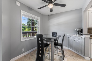 Wake up to peaceful water views and end your evenings surrounded on Wynmoor Golf Course in Florida - for sale on GolfHomes.com, golf home, golf lot