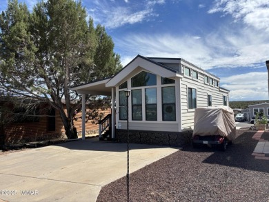 Welcome to your humble abode! This 2005 Chariot Eagle park model on Juniper Ridge R.V. Golf Resort in Arizona - for sale on GolfHomes.com, golf home, golf lot