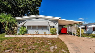 Trade your lawn mower for a fishing pole! This 55+ Lakeland on Wedgewood Golf Club in Florida - for sale on GolfHomes.com, golf home, golf lot