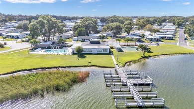 Trade your lawn mower for a fishing pole! This 55+ Lakeland on Wedgewood Golf Club in Florida - for sale on GolfHomes.com, golf home, golf lot