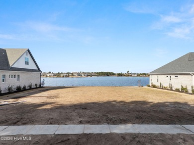 Build your dream home on a stunning Cardinal Lake waterfront on Compass Pointe Golf Course in North Carolina - for sale on GolfHomes.com, golf home, golf lot