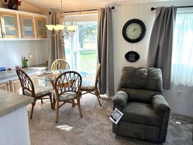 his charming 2008 park model home, fully furnished and ready to on Crystal Lake Club in Florida - for sale on GolfHomes.com, golf home, golf lot