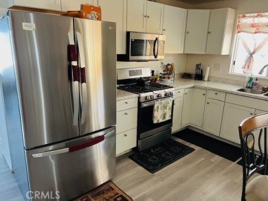 Wonderful opportunity to own this well-maintained single-story on Colonial Country Club in California - for sale on GolfHomes.com, golf home, golf lot