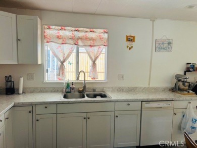 Wonderful opportunity to own this well-maintained single-story on Colonial Country Club in California - for sale on GolfHomes.com, golf home, golf lot