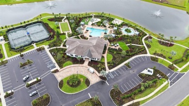 Experience resort style living in the spectacular, gated and on Esplanade Golf and Country at Lakewood Ranch in Florida - for sale on GolfHomes.com, golf home, golf lot