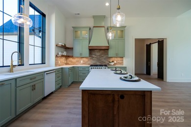 Experience refined living in this stunning new construction on River Oaks Country Club in North Carolina - for sale on GolfHomes.com, golf home, golf lot