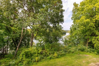 Incredible lake setting! Bright, cheery, and full of natural on Eagle Ridge Inn and Resort in Illinois - for sale on GolfHomes.com, golf home, golf lot
